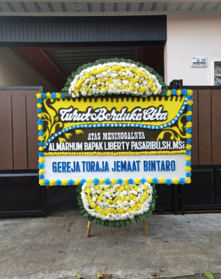 Papan Bunga Duka di Balige